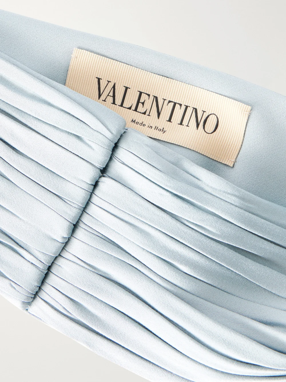 Close-up detail of the Valentino Garavani Plissé Satin Belt