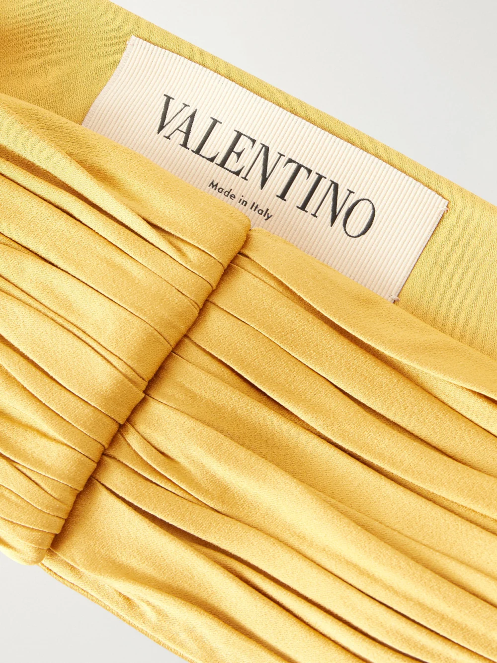 Close-up detail of the Valentino Garavani Plissé Satin Belt