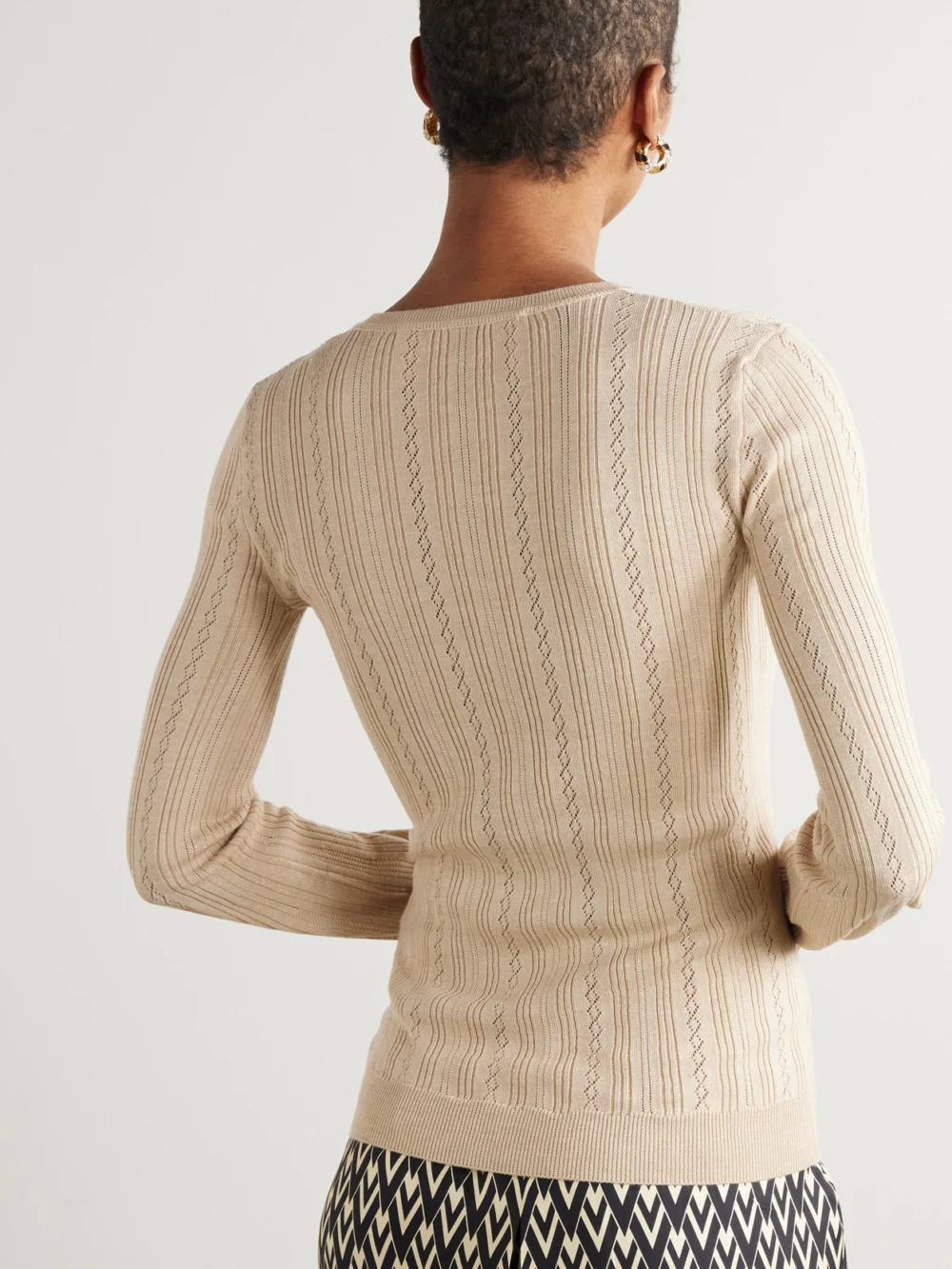 Back view of the Valentino Garavani Pointelle-knit Wool Sweater
