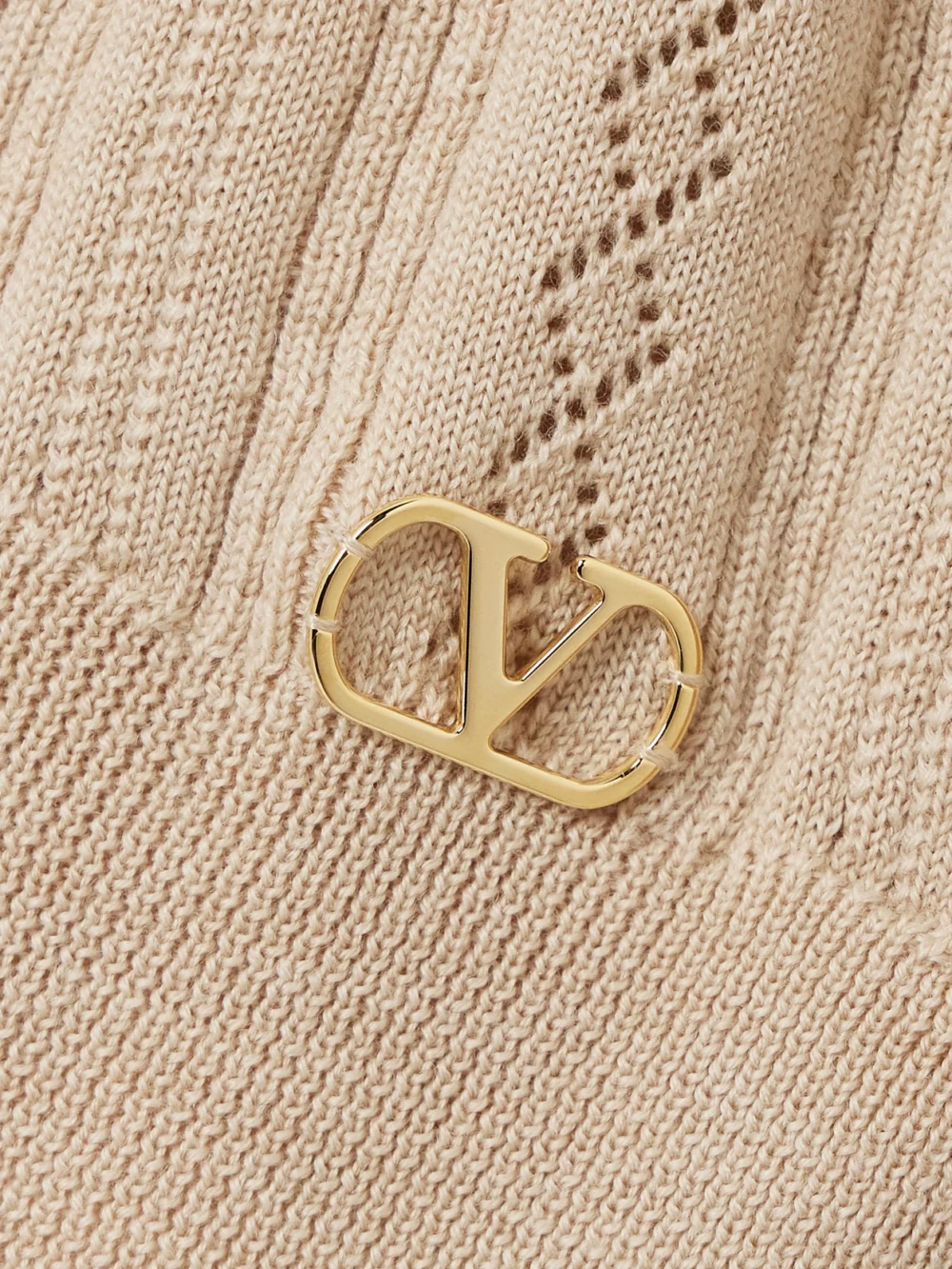 Close-up detail of the Valentino Garavani Pointelle-knit Wool Sweater