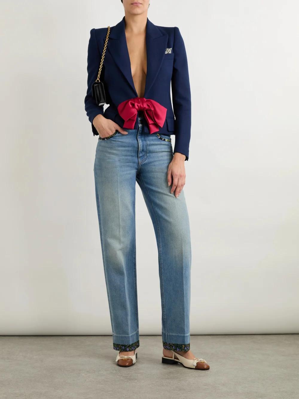 Valentino Garavani Printed Chiffon-trimmed High-rise Straight-leg Jeans, worn by a model
