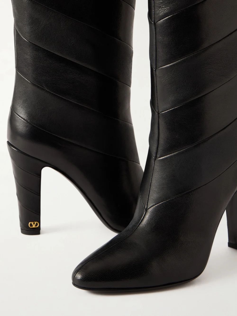 Close-up detail of the Valentino Garavani Rayons 100 Paneled Leather Knee Boots