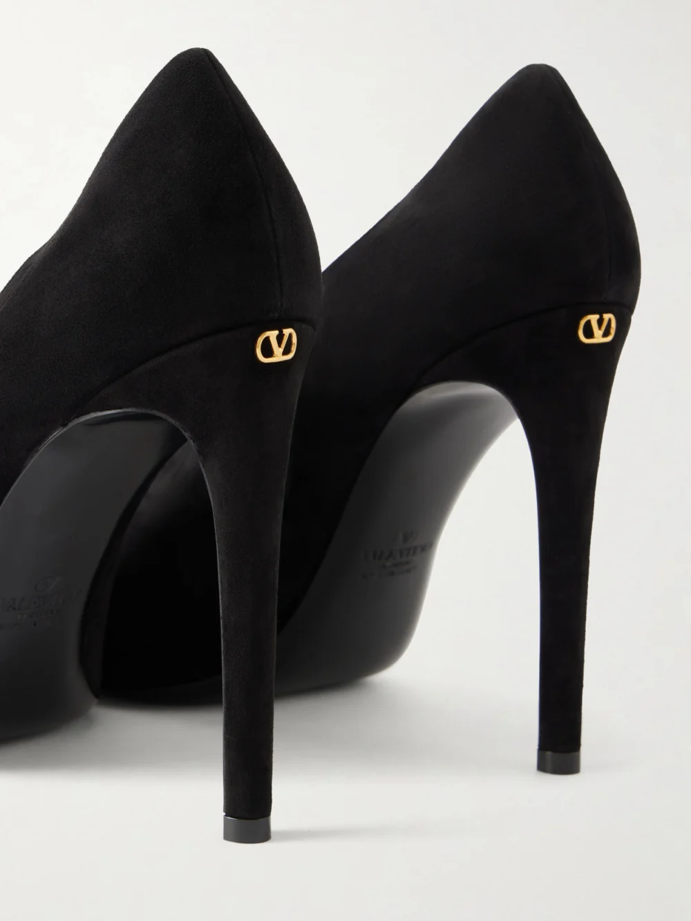 Close-up detail of the Valentino Garavani Révélé Pvc-trimmed Suede Sandals