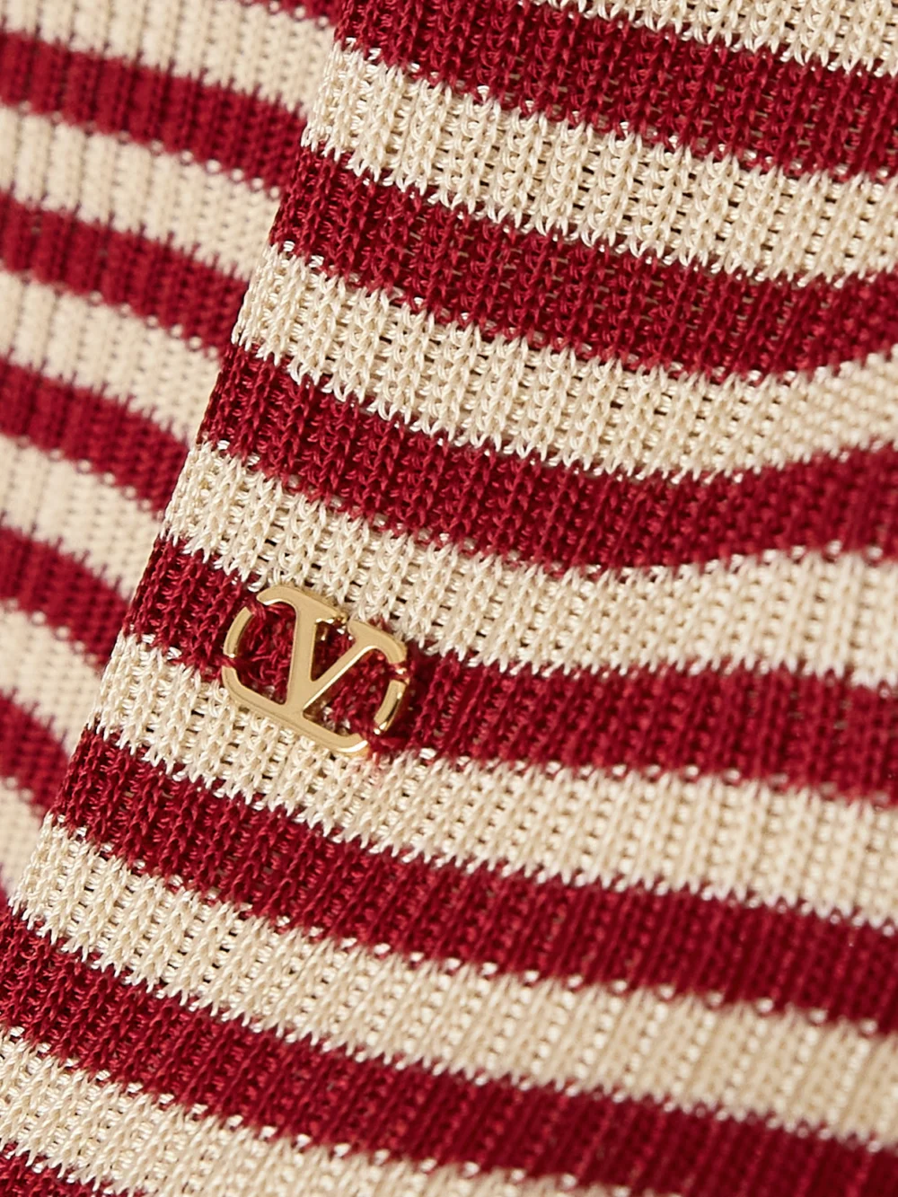 Close-up detail of the Valentino Garavani Ribbed Striped Silk Sweater