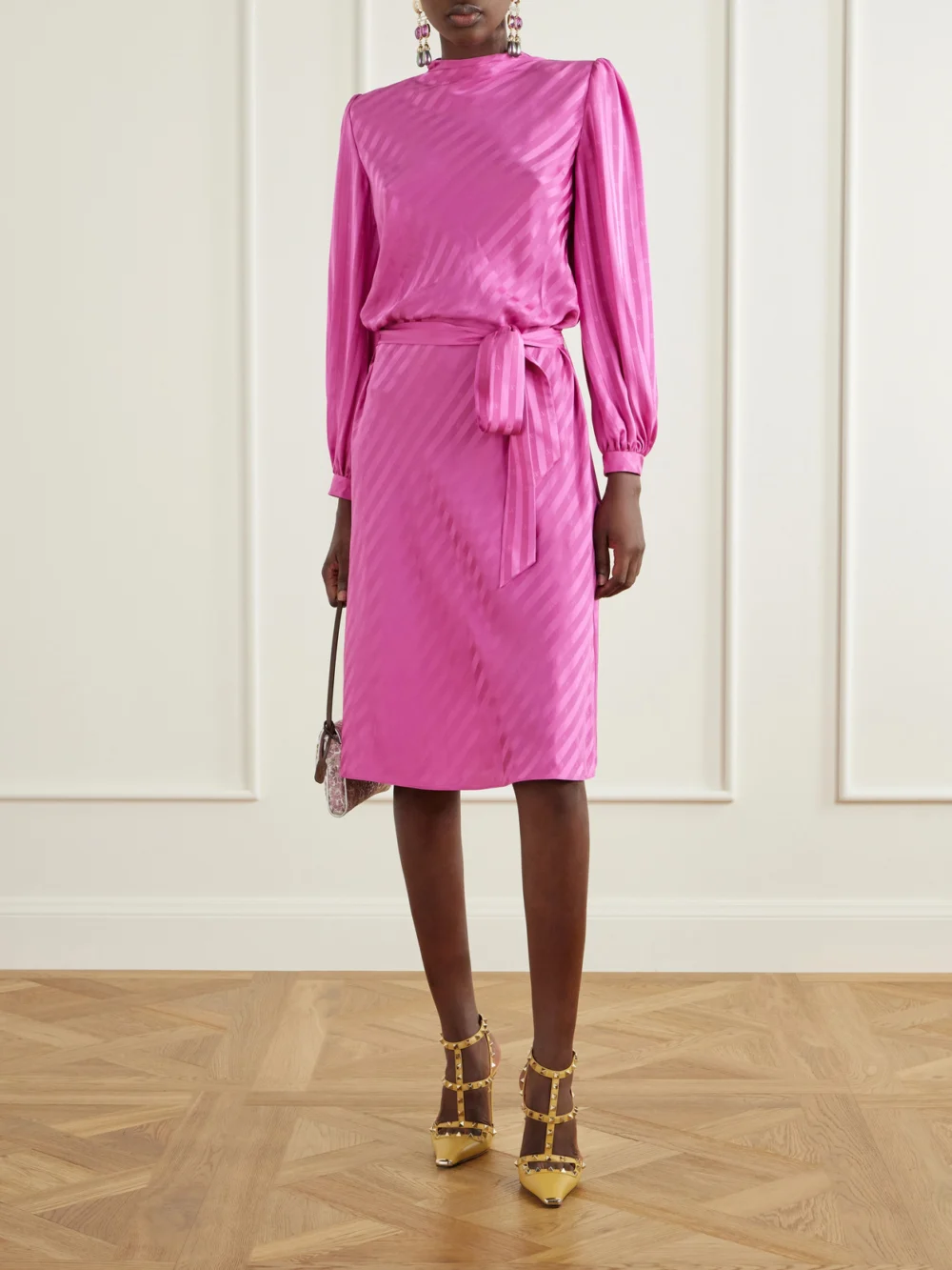 Valentino Garavani Rockstud 100 Leather Pumps, styled view