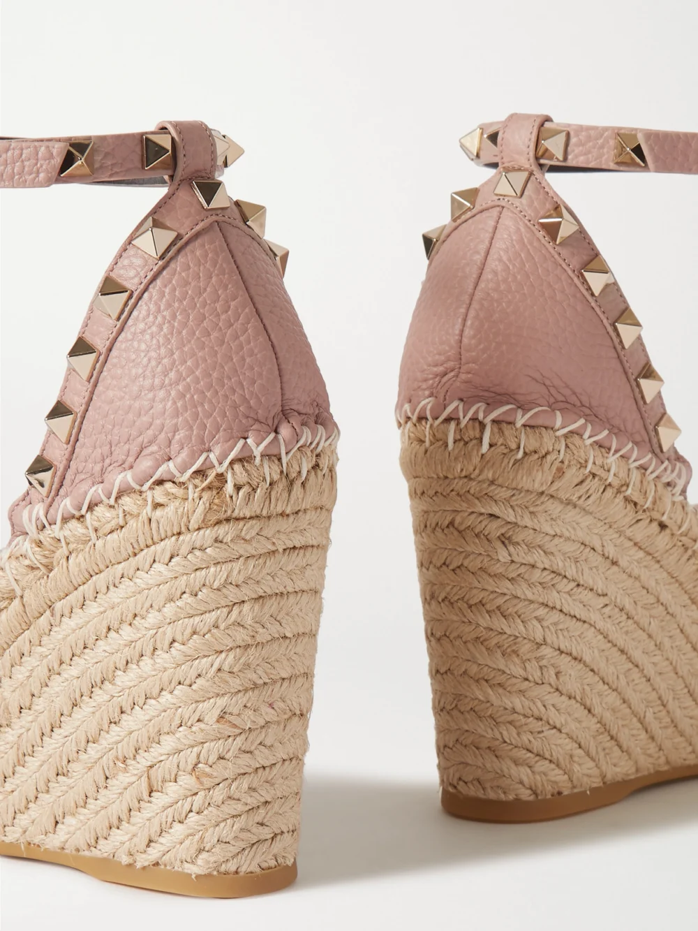 Close-up detail of the Valentino Garavani Rockstud 105 Textured-leather Espadrille Wedge Sandals