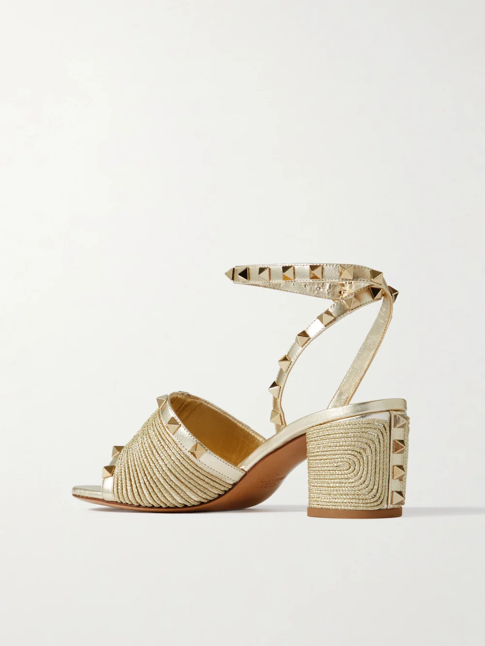Back view of the Valentino Garavani Rockstud 60 Embellished Raffia-trimmed Metallic Leather Sandals