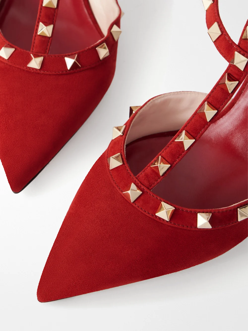 Close-up detail of the Valentino Garavani Rockstud 65 Suede Pumps