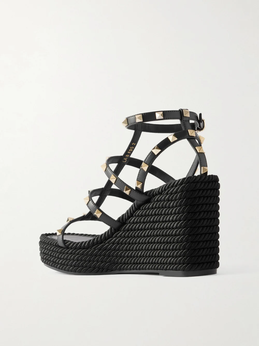 Back view of the Valentino Garavani Rockstud 95 Leather Wedge Sandals