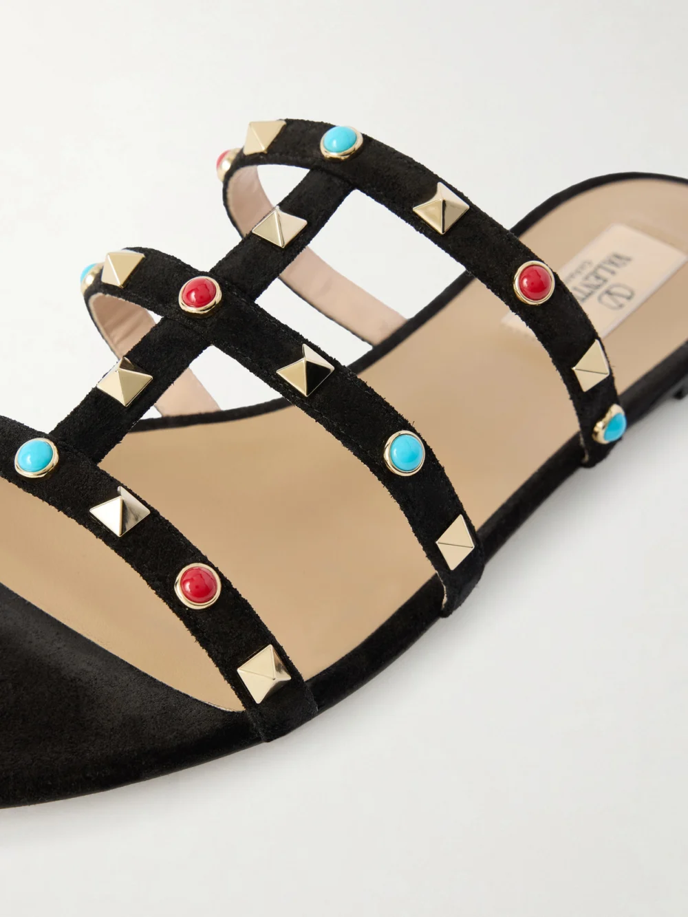 Close-up detail of the Valentino Garavani Rockstud Bead-embellished Suede Sandals