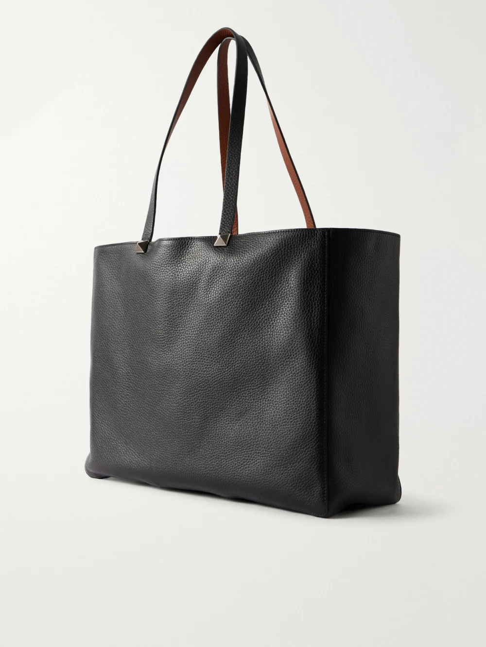 Back view of the Valentino Garavani Rockstud Double Reversible Studded Textured-leather Tote Bag