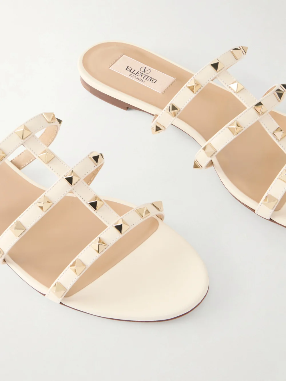 Close-up detail of the Valentino Garavani Rockstud Embellished Leather Sandals