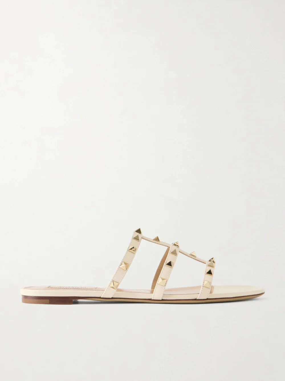 Valentino Garavani Rockstud Embellished Leather Sandals in ivory
