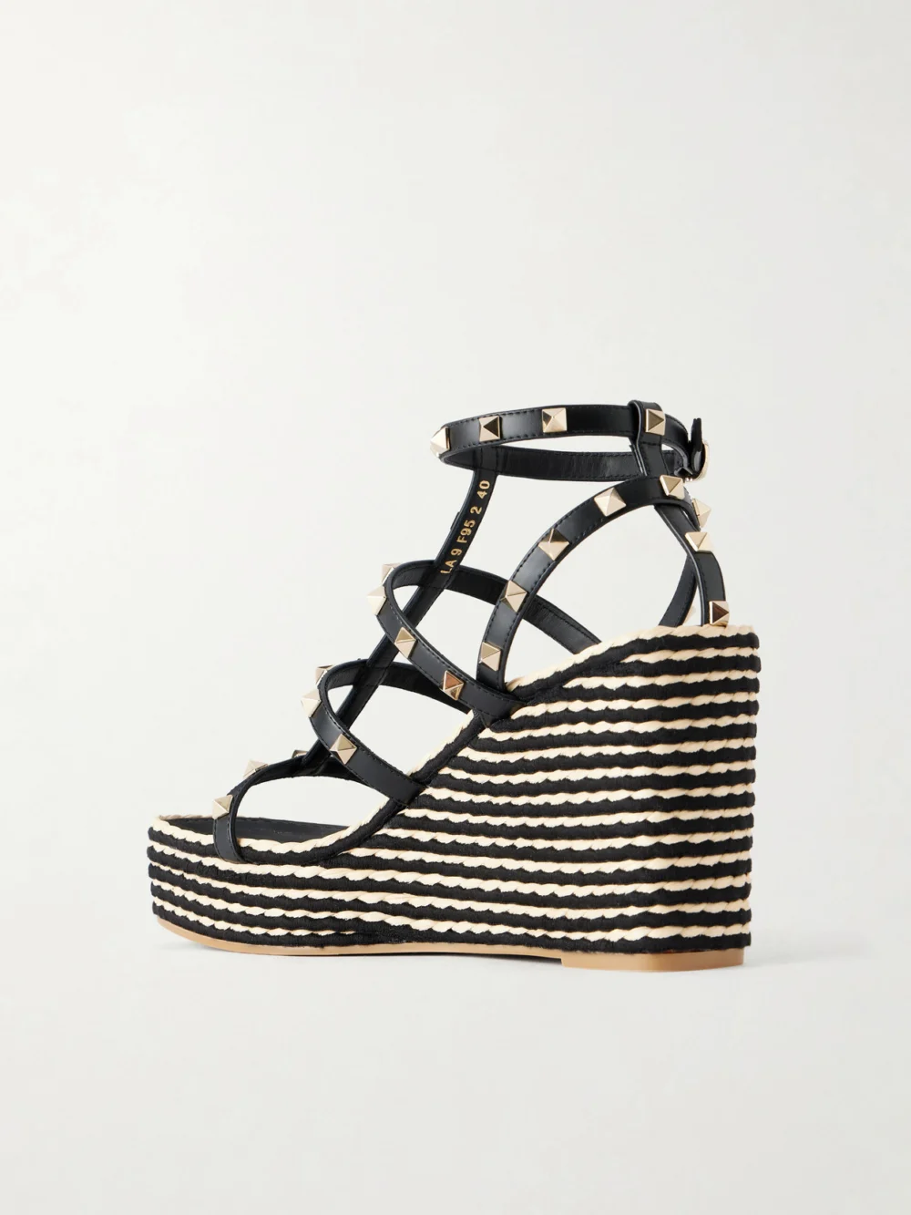 Back view of the Valentino Garavani Rockstud Embellished Leather Wedge Espadrilles