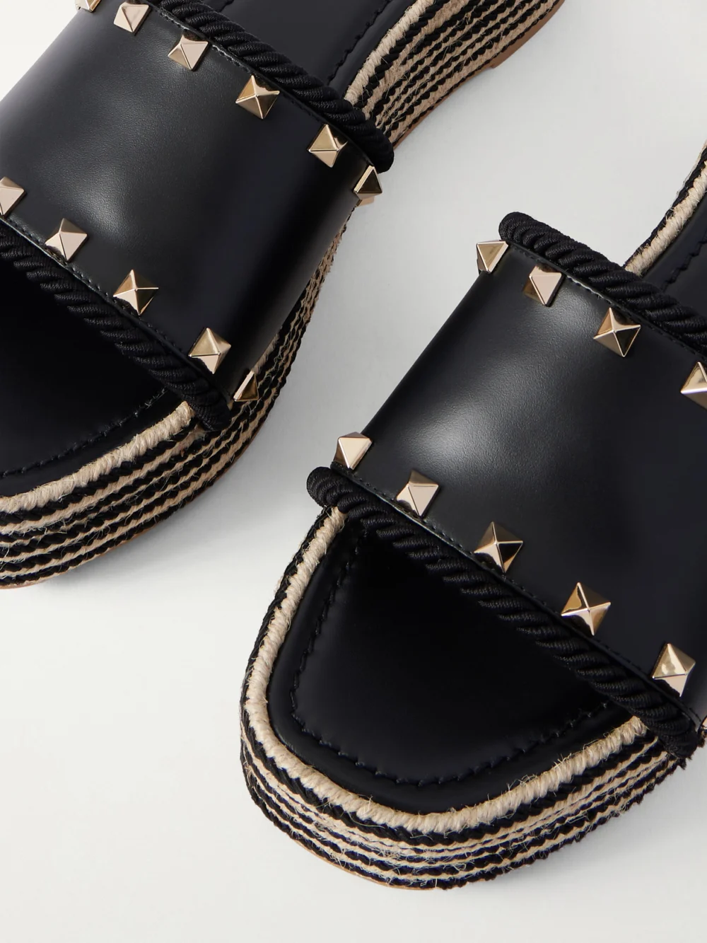 Close-up detail of the Valentino Garavani Rockstud Leather Platform Espadrille Slides
