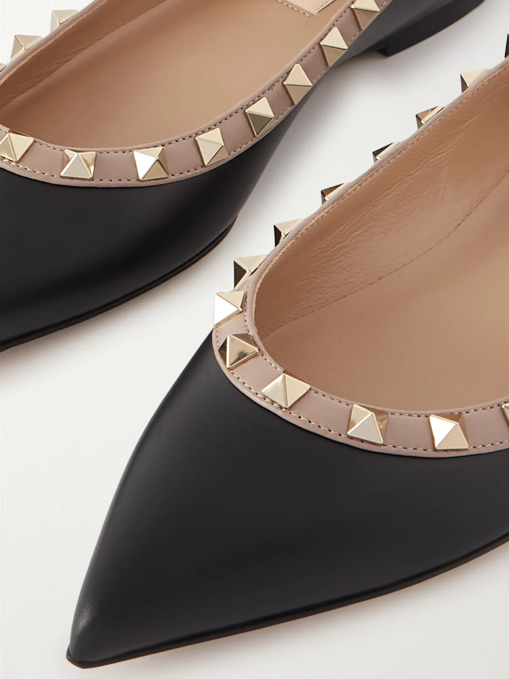 Close-up detail of the Valentino Garavani Rockstud Leather Point-toe Flats
