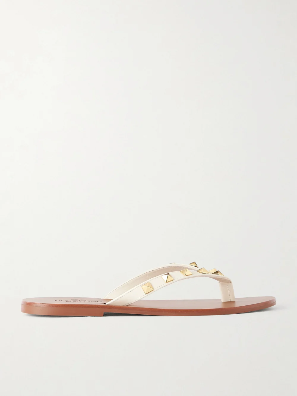 Valentino Garavani Rockstud Leather Thong Sandals in ivory