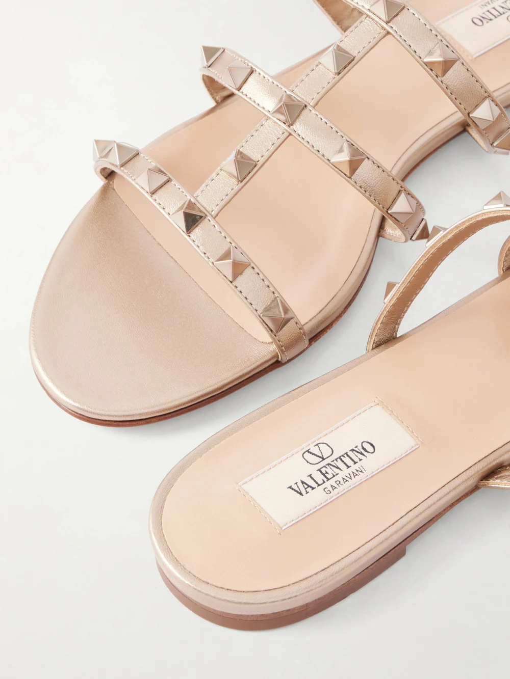 Close-up detail of the Valentino Garavani Rockstud Metallic Leather Sandals
