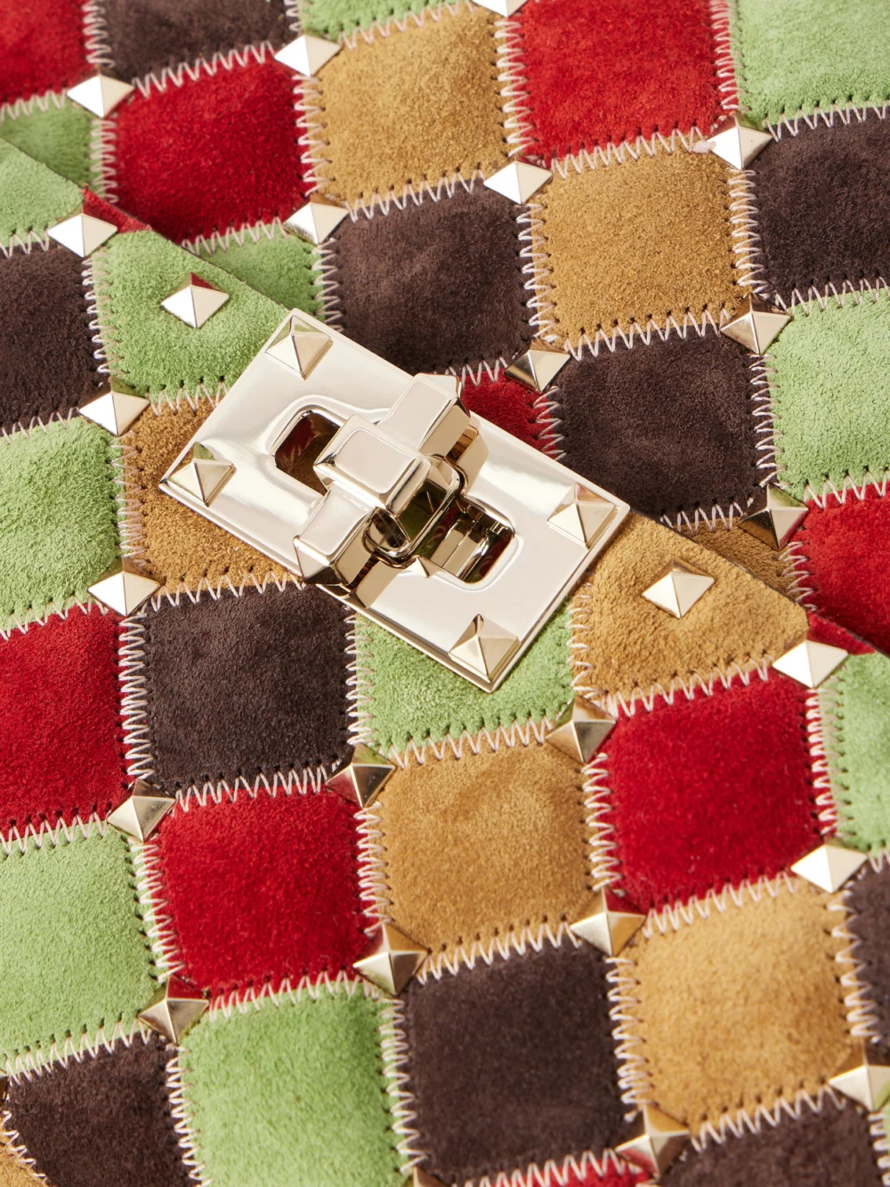 Close-up detail of the Valentino Garavani Rockstud Spike Studded Suede Shoulder Bag