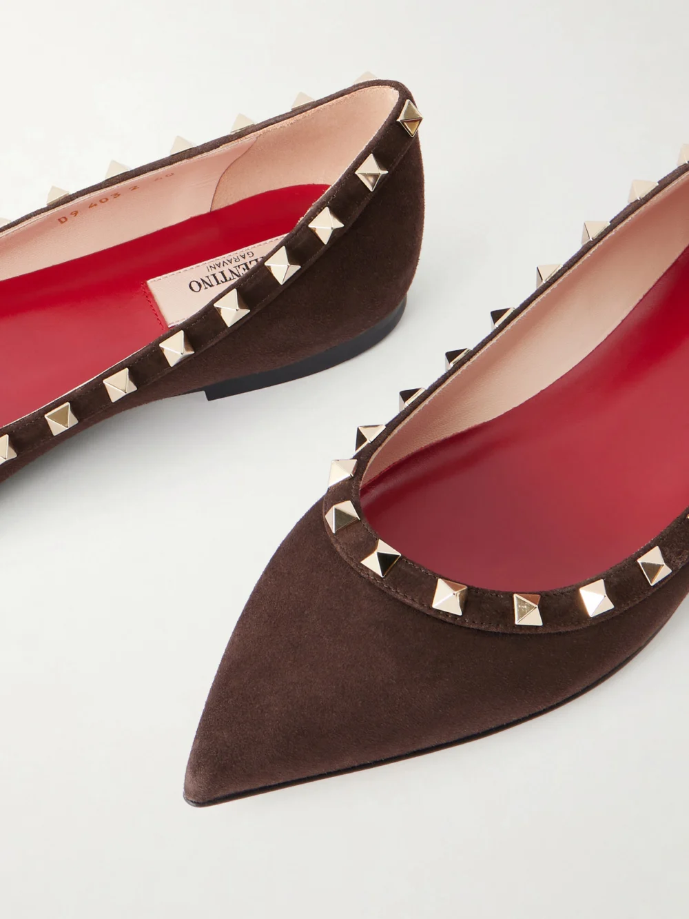 Close-up detail of the Valentino Garavani Rockstud Suede Ballet Flats