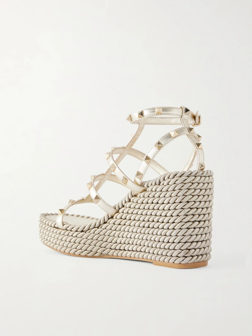 Back view of the Valentino Garavani Rockstud Tourchon Metallic Leather Espadrille Wedge Sandals