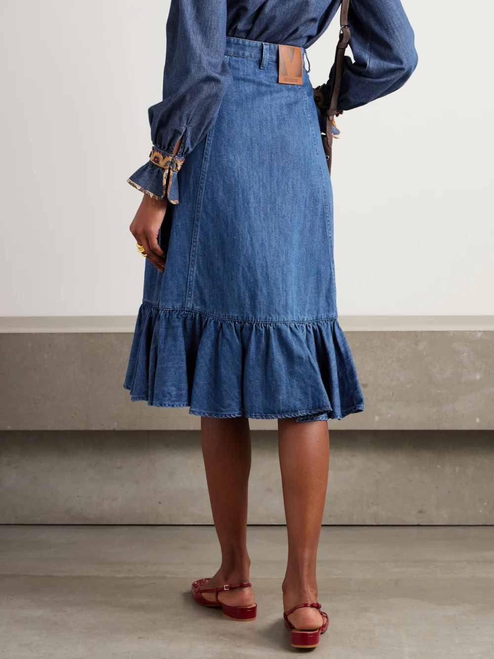 Back view of the Valentino Garavani Ruffled Denim Midi Skirt