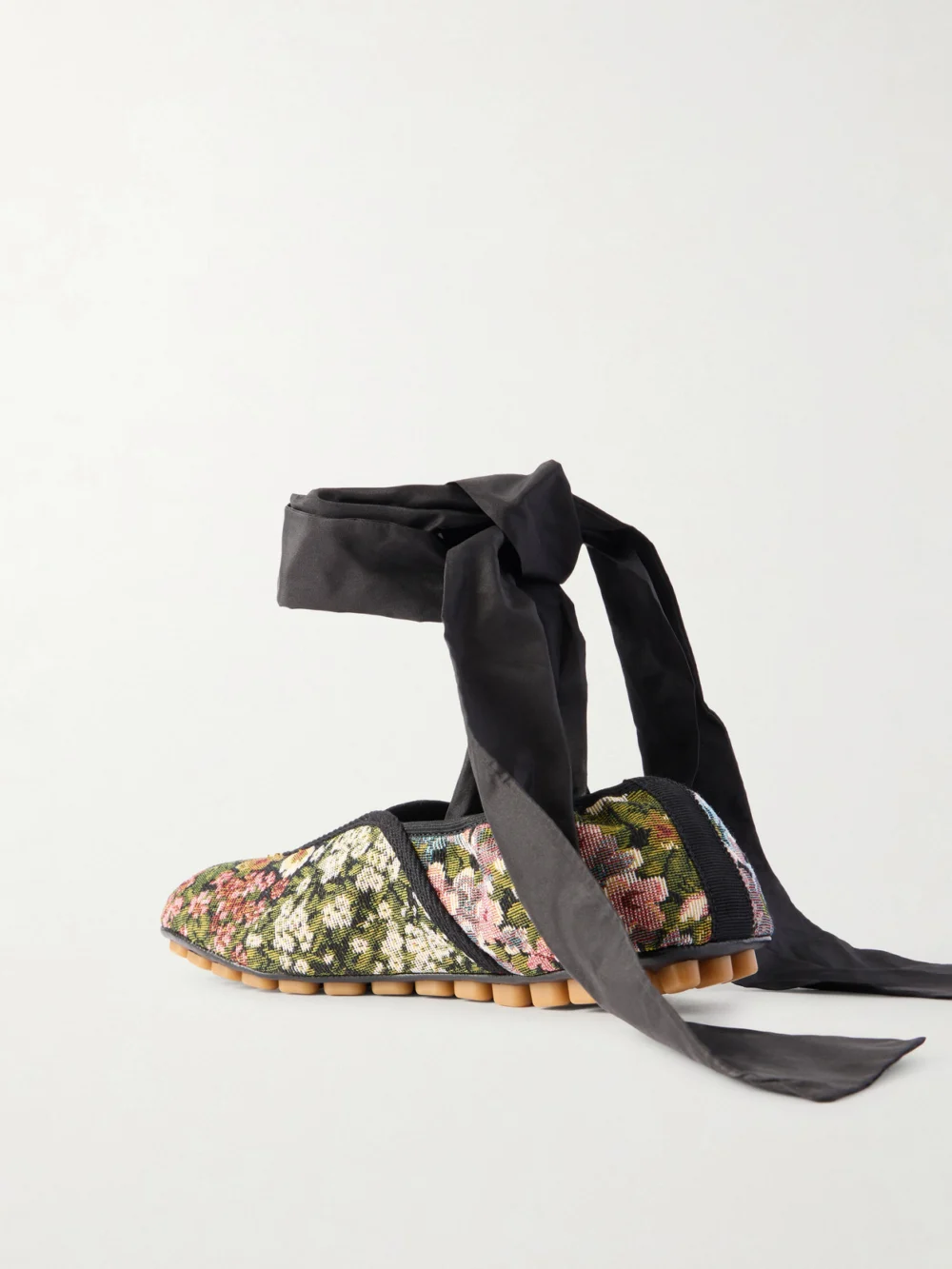 Back view of the Valentino Garavani Rythmika Lace-up Floral-jacquard Canvas Ballet Flats