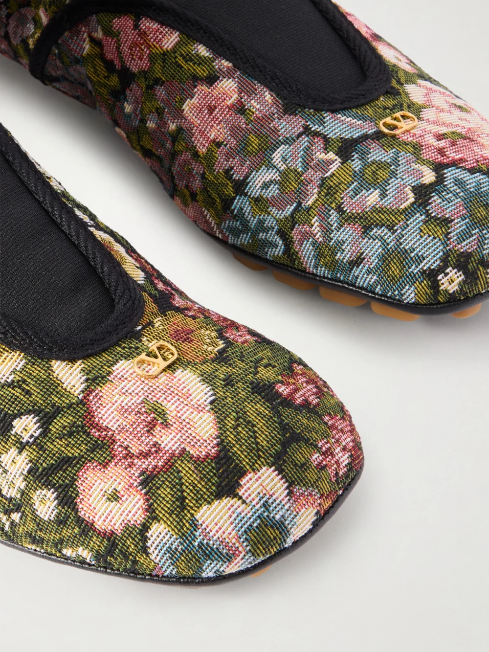 Close-up detail of the Valentino Garavani Rythmika Lace-up Floral-jacquard Canvas Ballet Flats