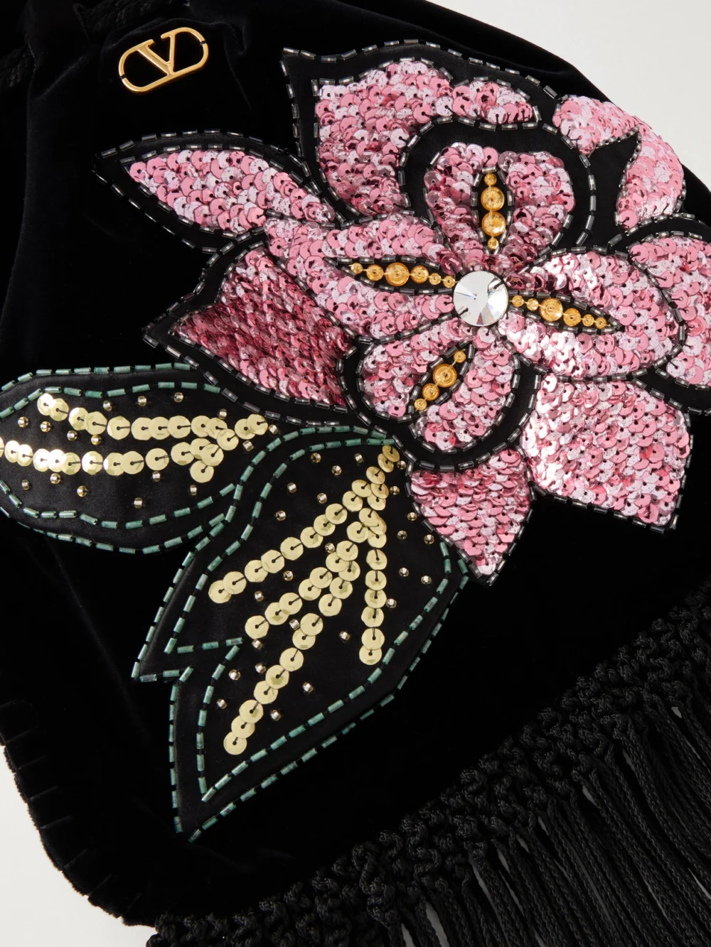Close-up detail of the Valentino Garavani Sequin and Bead-embellished Fringed Velvet Drawstring Shoulder Bag