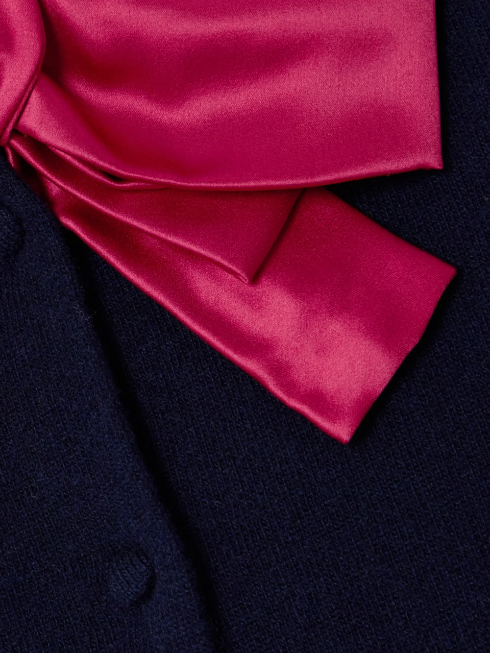 Close-up detail of the Valentino Garavani Silk Satin-trimmed Wool Cardigan
