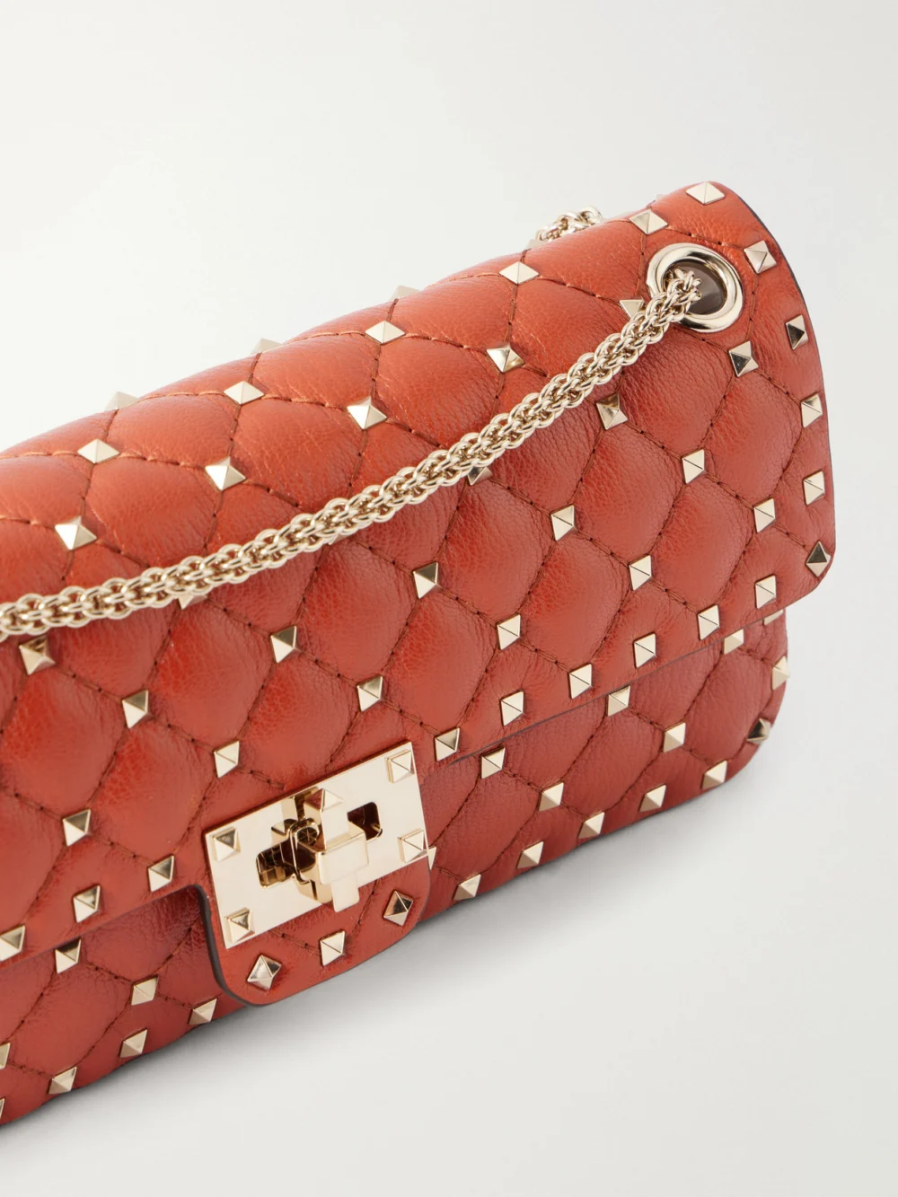 Close-up detail of the Valentino Garavani Spike Small Studded Quilted Leather Shoulder Bag