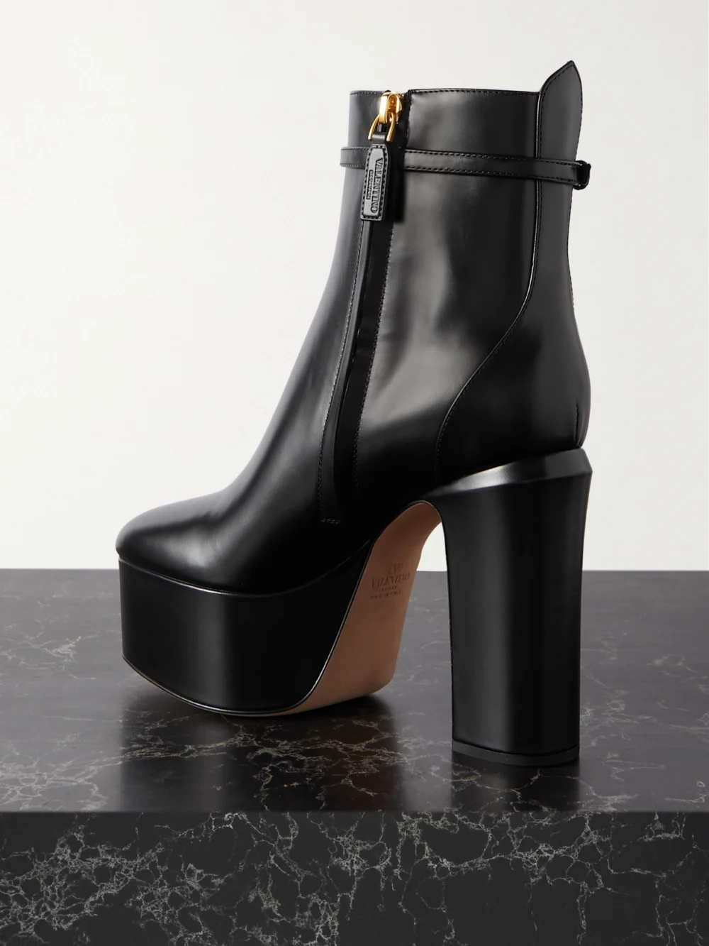 Back view of the Valentino Garavani Tan-go 120 Leather Platform Ankle Boots