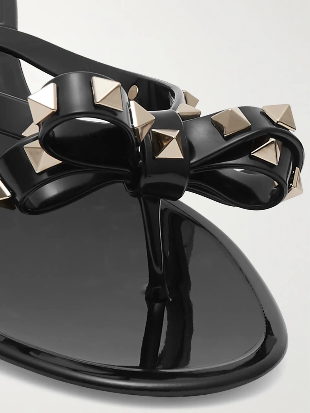Close-up detail of the Valentino Garavani The Rockstud Rubber Flip Flops