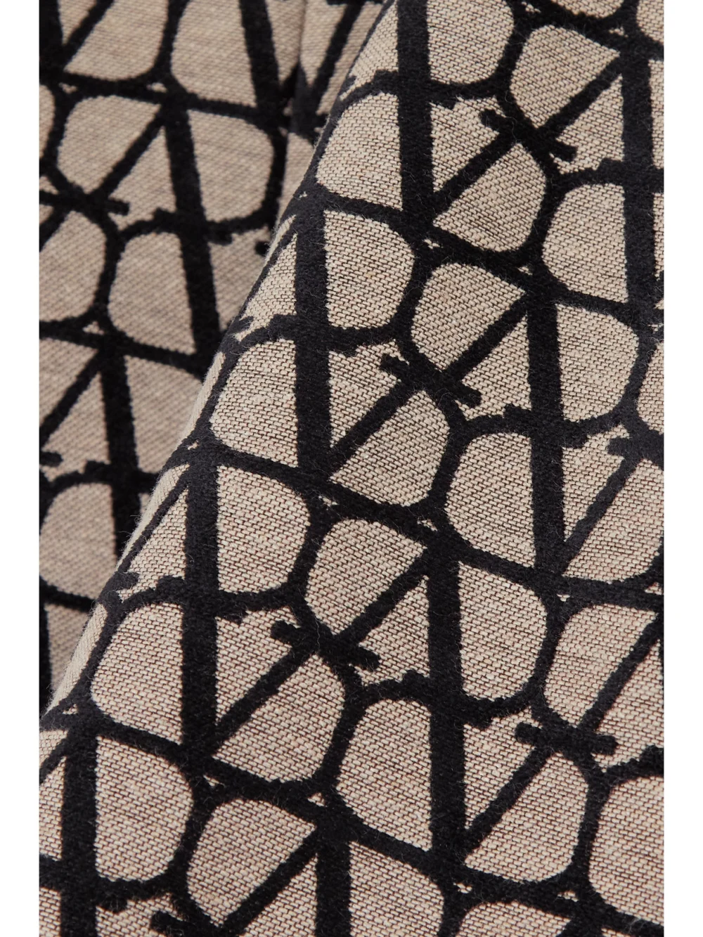 Close-up detail of the Valentino Garavani Toile Iconographe Leather-trimmed Flocked Canvas Shorts