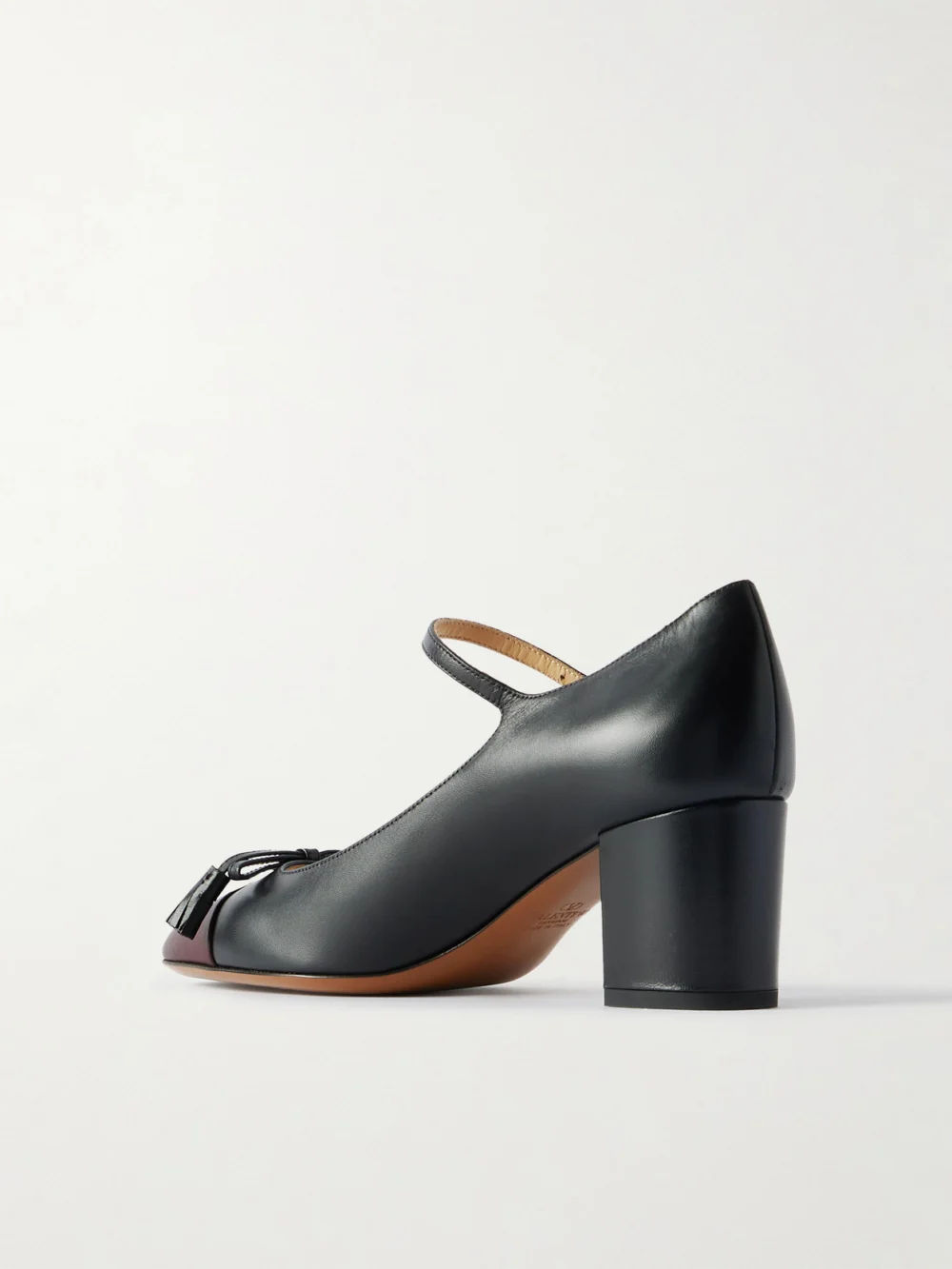 Back view of the Valentino Garavani Valet Du Roi 60 Tasseled Two-tone Leather Mary Jane Pumps
