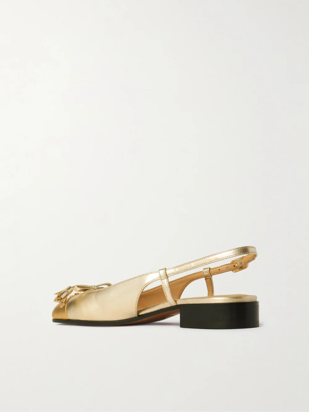 Back view of the Valentino Garavani Valet Du Roi Tasseled Metallic Leather Slingback Pumps
