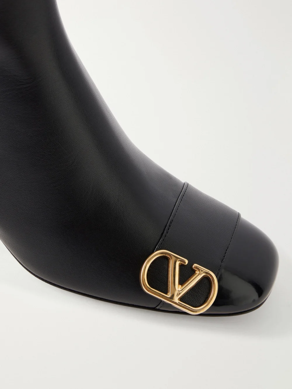 Close-up detail of the Valentino Garavani Veeside 60 Vlogo-embellished Leather Ankle Boots