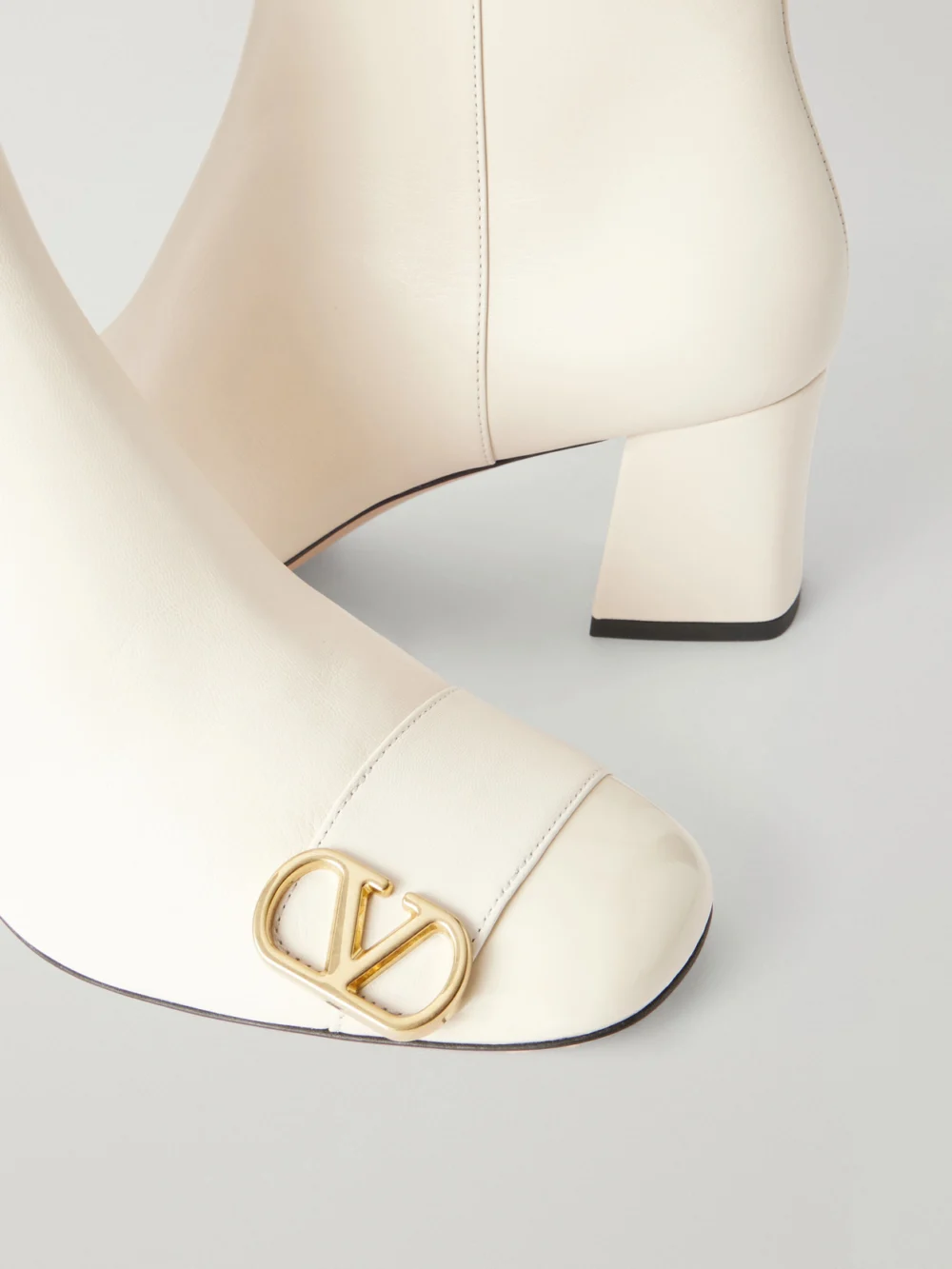 Close-up detail of the Valentino Garavani Veeside 60 Vlogo-embellished Leather Ankle Boots