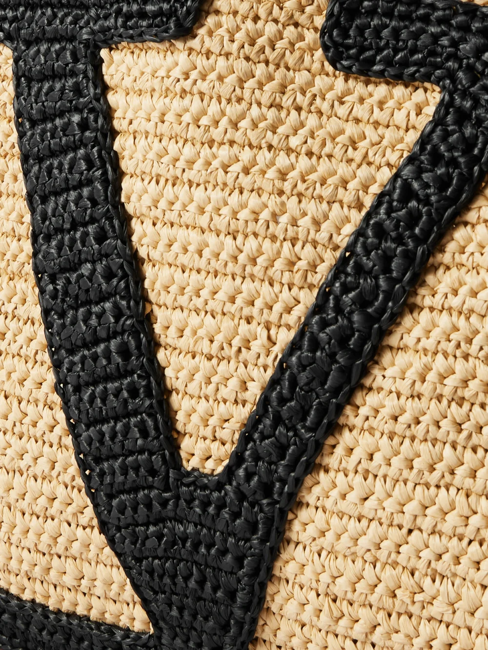 Close-up detail of the Valentino Garavani Viva Superstar Crocheted Raffia Tote