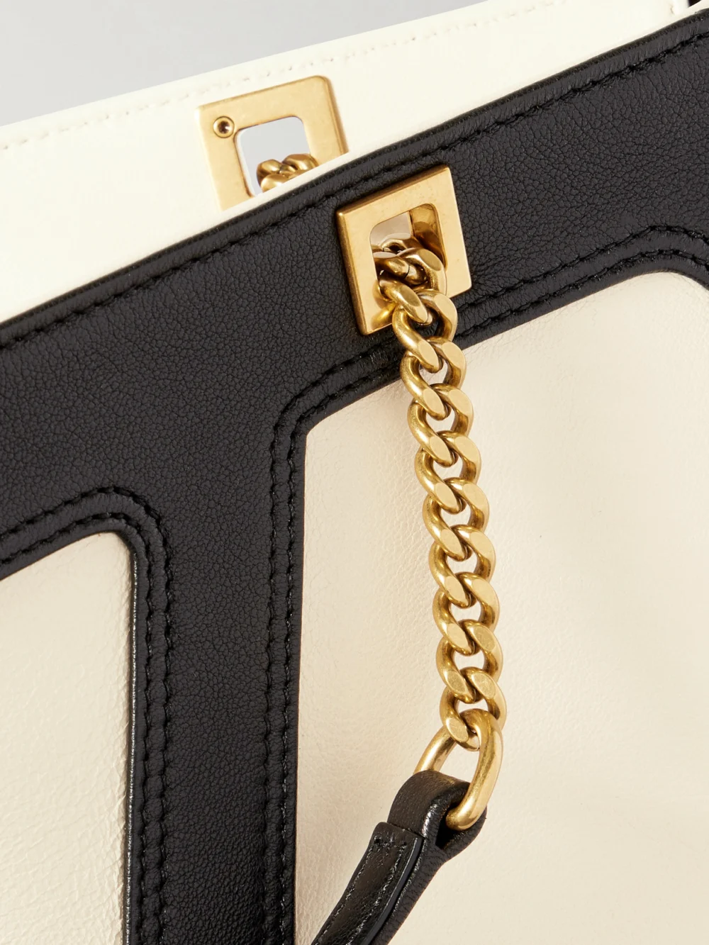 Close-up detail of the Valentino Garavani Viva Superstar Medium Two-tone Leather Shoulder Bag