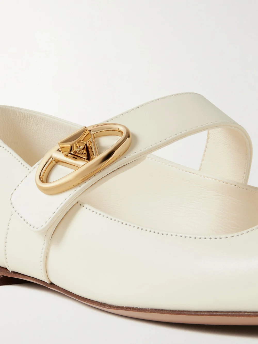 Close-up detail of the Valentino Garavani Vlogo Locker Leather Ballet Flats