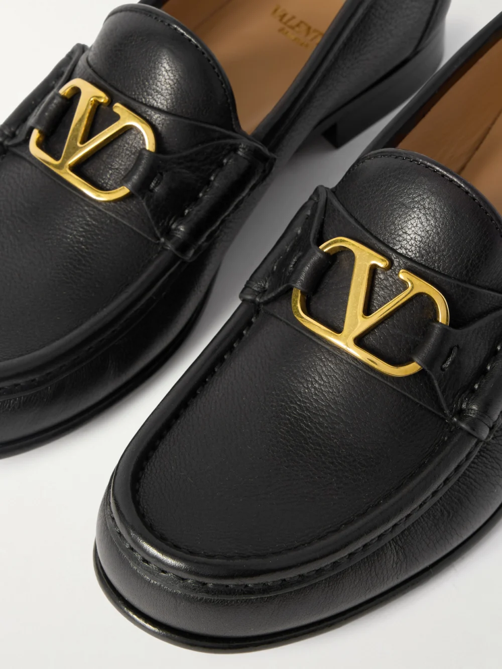 Close-up detail of the Valentino Garavani Vlogo Signature 20 Leather Loafers