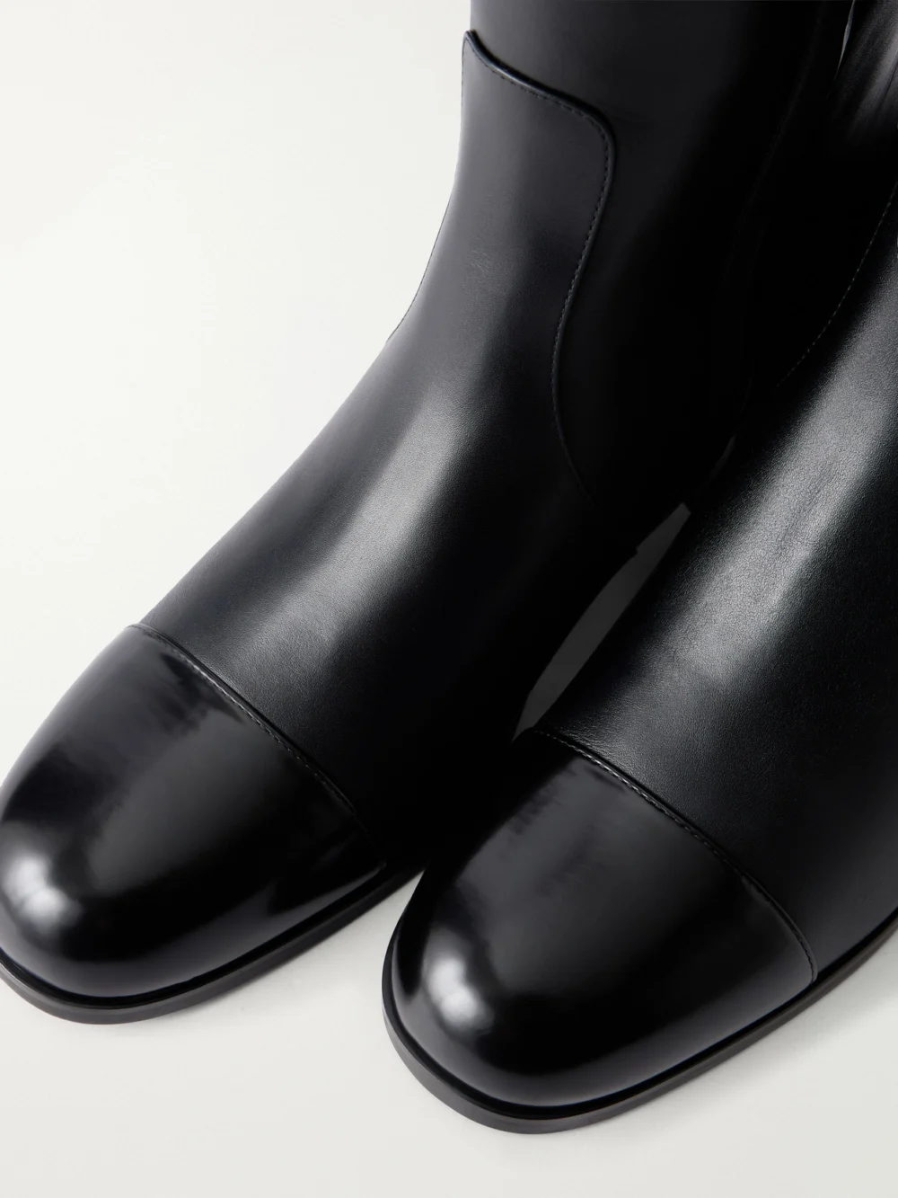 Close-up detail of the Valentino Garavani Zimmt 60 Leather Knee Boots