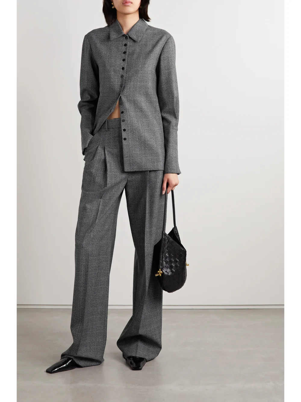 Veronica de Piante Billie Pleated Prince of Wales Checked Wool Wide-leg Pants, worn by a model