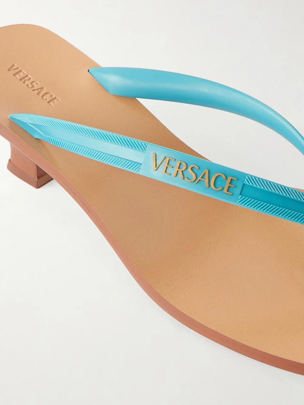 Close-up detail of the Versace 40 Rubber Thong Sandals