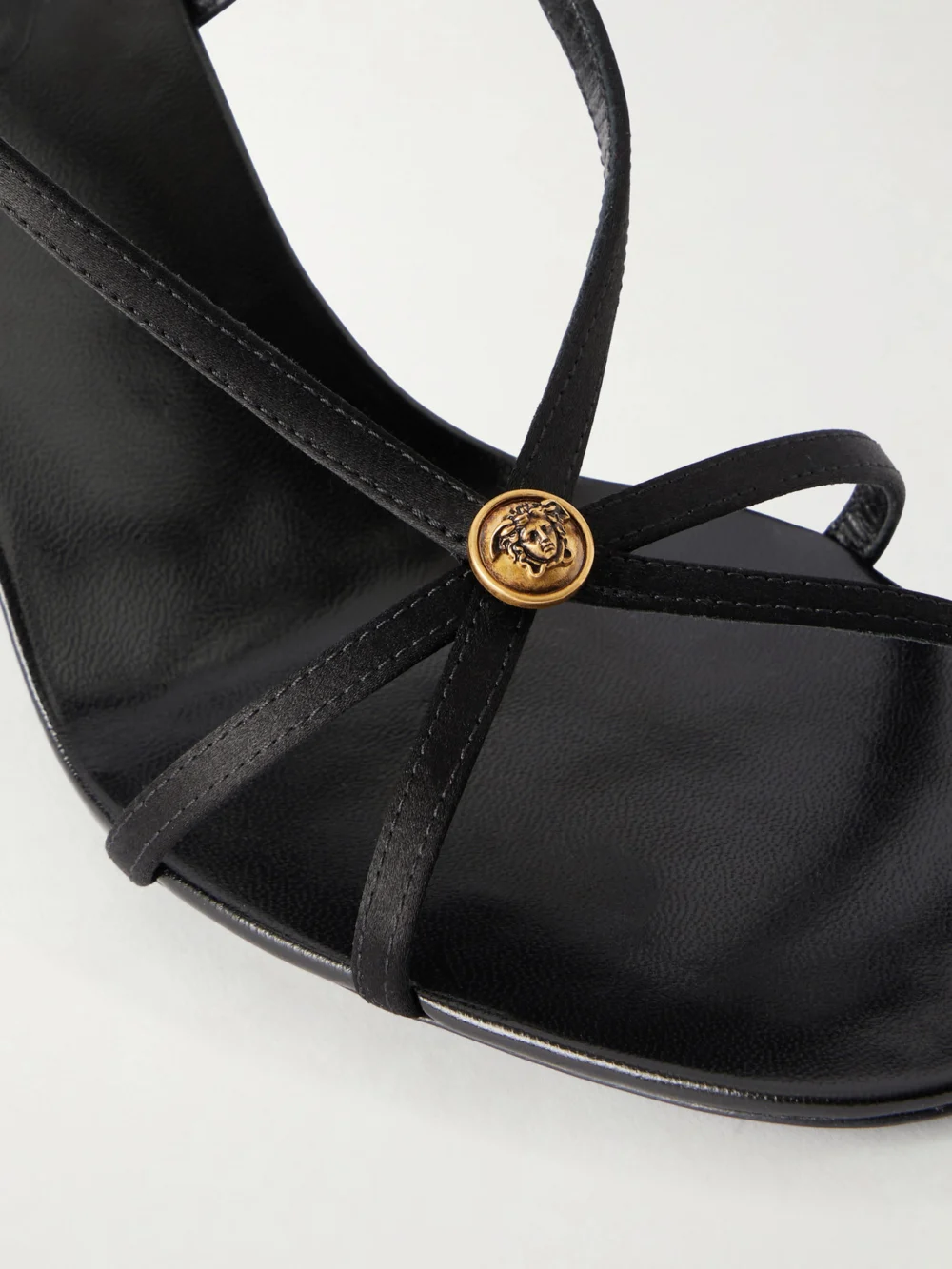 Close-up detail of the Versace 80 Satin Logo-embellished Sandals