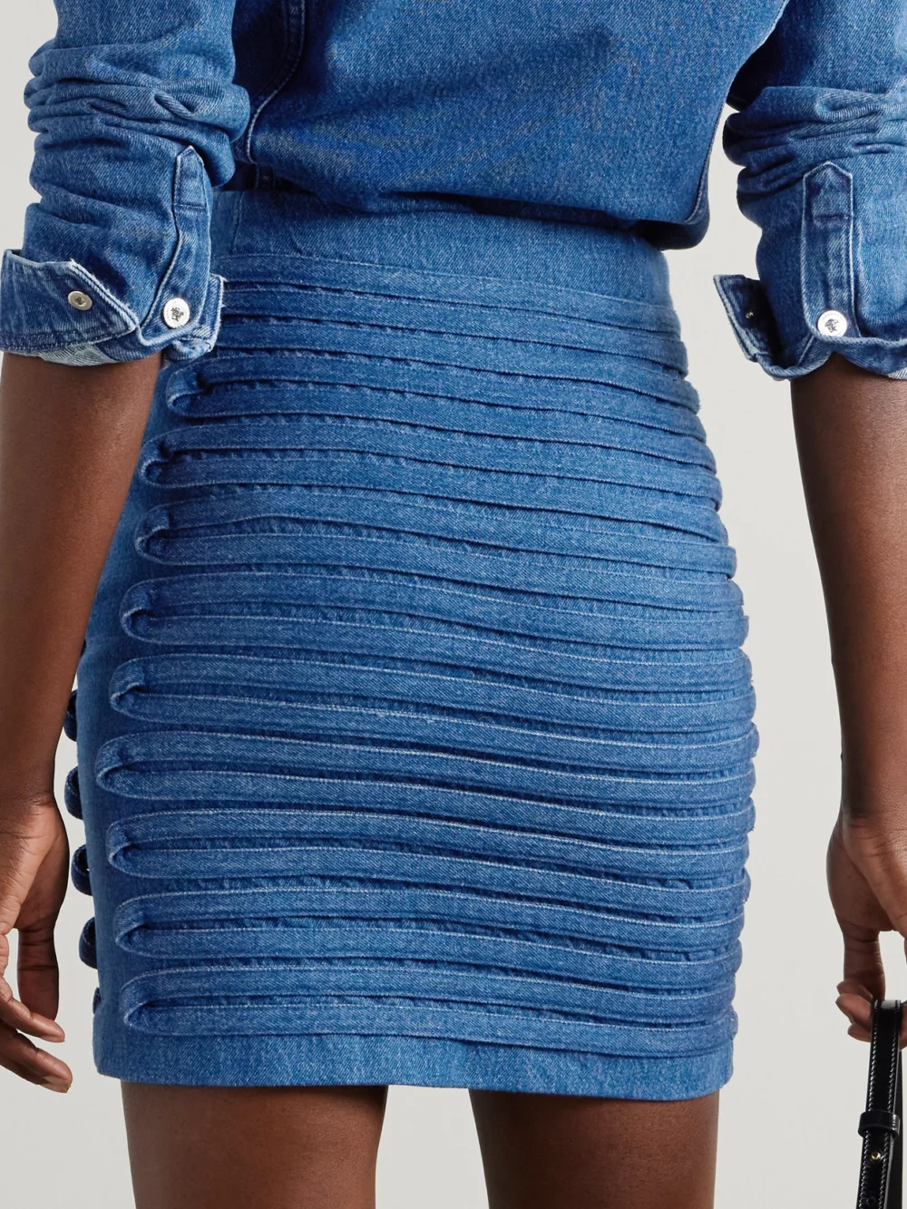 Back view of the Versace Appliquéd Denim Mini Skirt