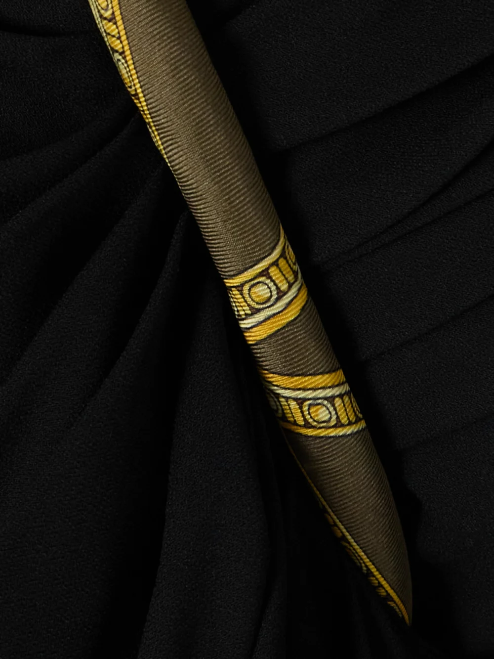 Close-up detail of the Versace Asymmetric Open-back Draped Printed Silk Twill-trimmed Cady Midi Dress