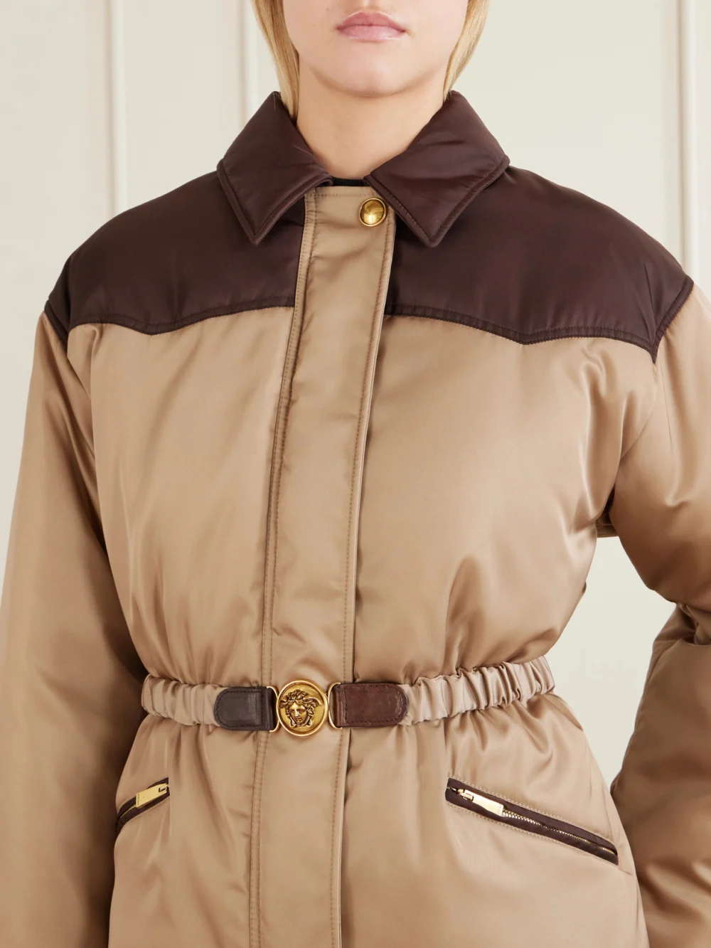 Close-up detail of the Versace Belted Padded Shell Jacket