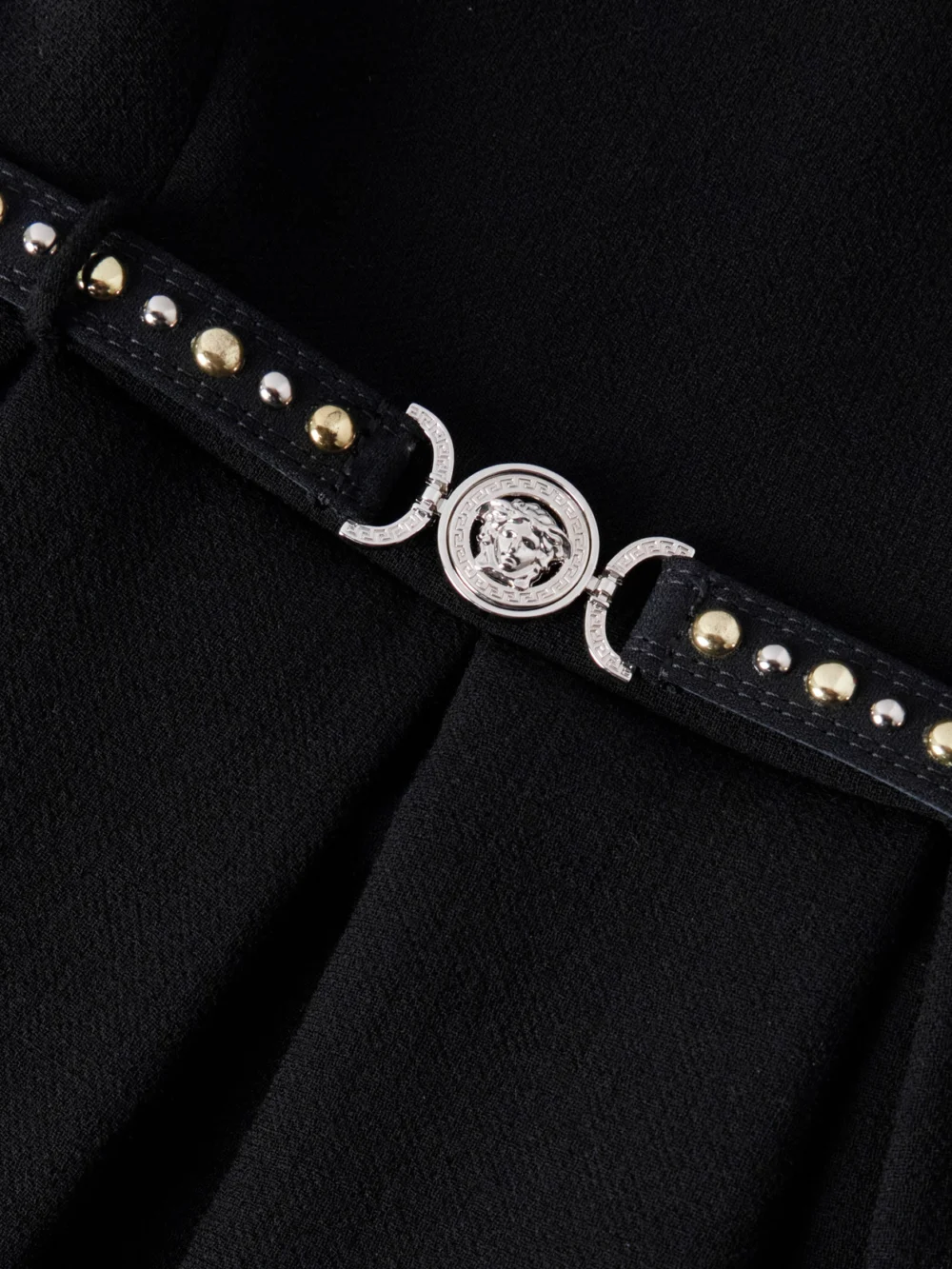 Close-up detail of the Versace Belted Wool-crepe Mini Dress